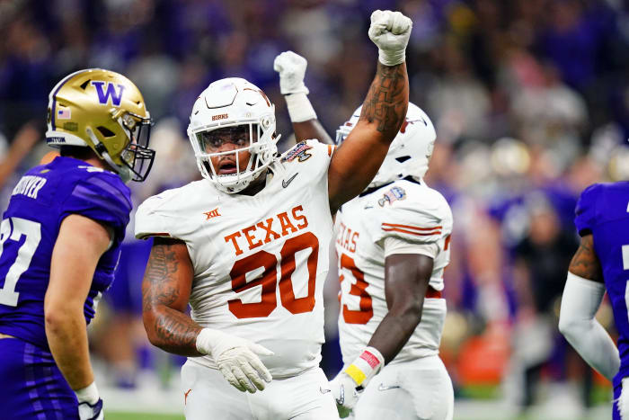 Texas Longhorns defensive lineman Bron Murphy celebrates a fourth-down stop against Washington in the Sugar Bowl.
